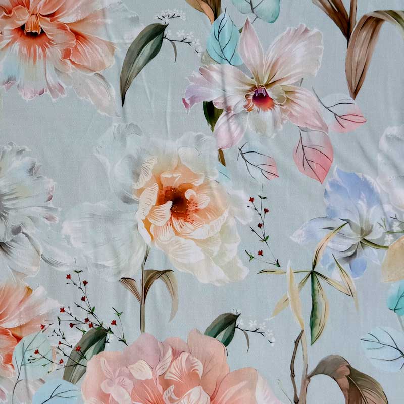 Fast stof med sommer blomster på lyseblå bund