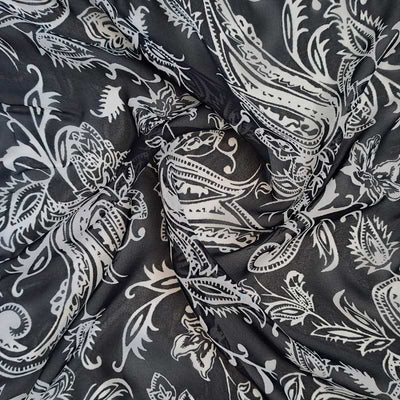 Chiffon med paisley inspireret print på sort bund - KreStoffer