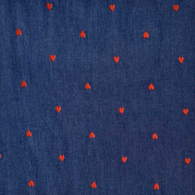 Denim med broderede hjerter mellemblå