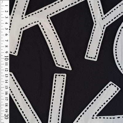 Digital viscose jersey med store bogstaver - KreStoffer