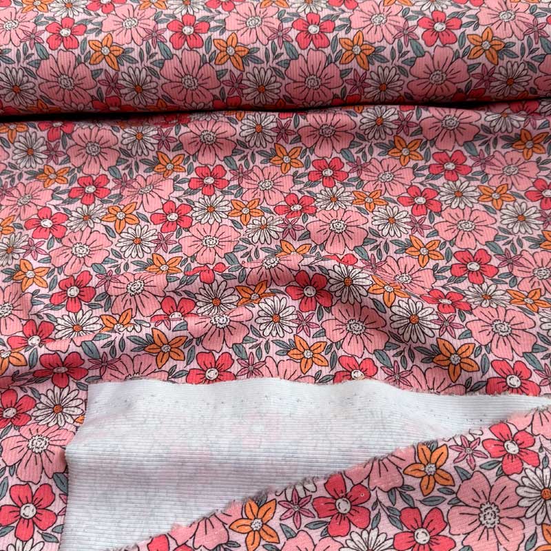 Drop needle digitalprint rib jersey med blomster i forårs farver