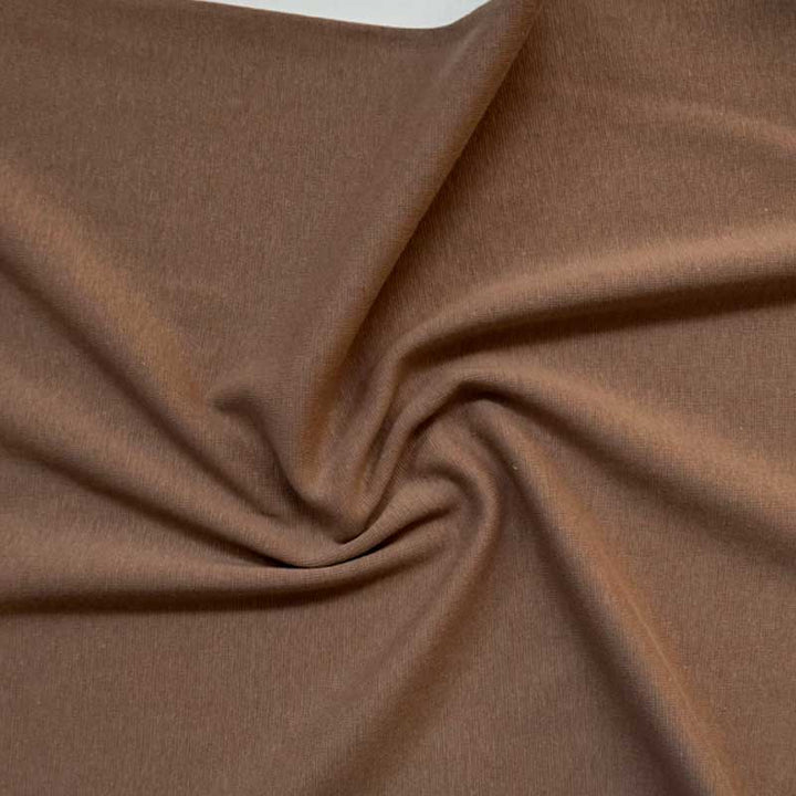 Ensfarvet rib mørk beige