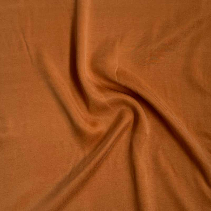 Ensfarvet viscose satin abricos