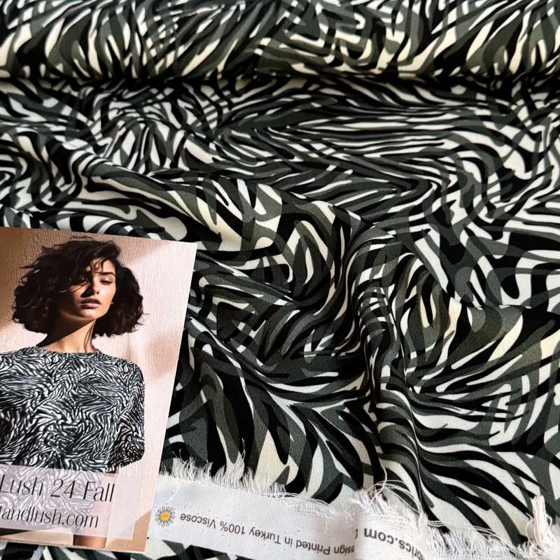 Fast viscose med abstrakt zebra print - KreStoffer