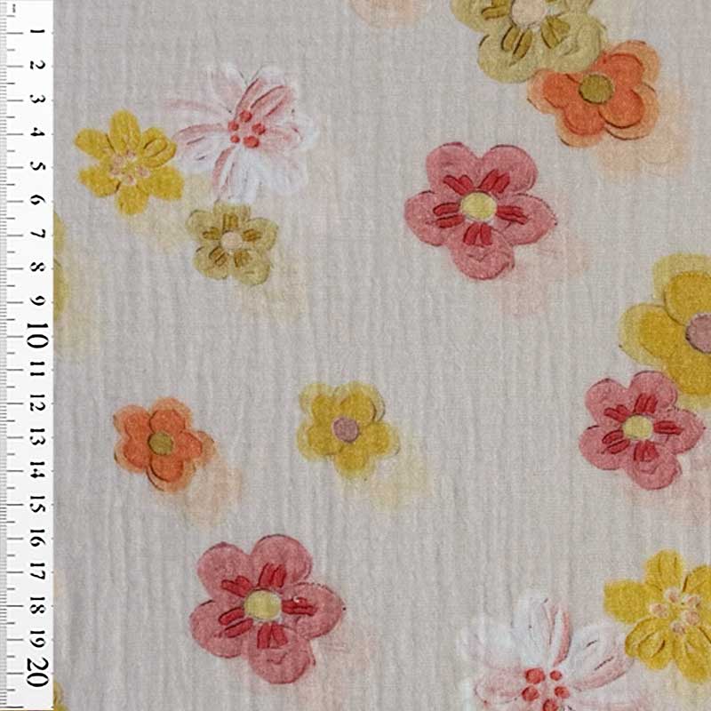 Gauze med blomster på lyserød bund
