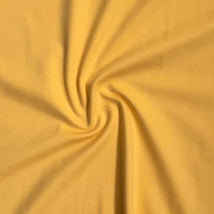 Kraftig ensfarvet viscose jersey smørgul