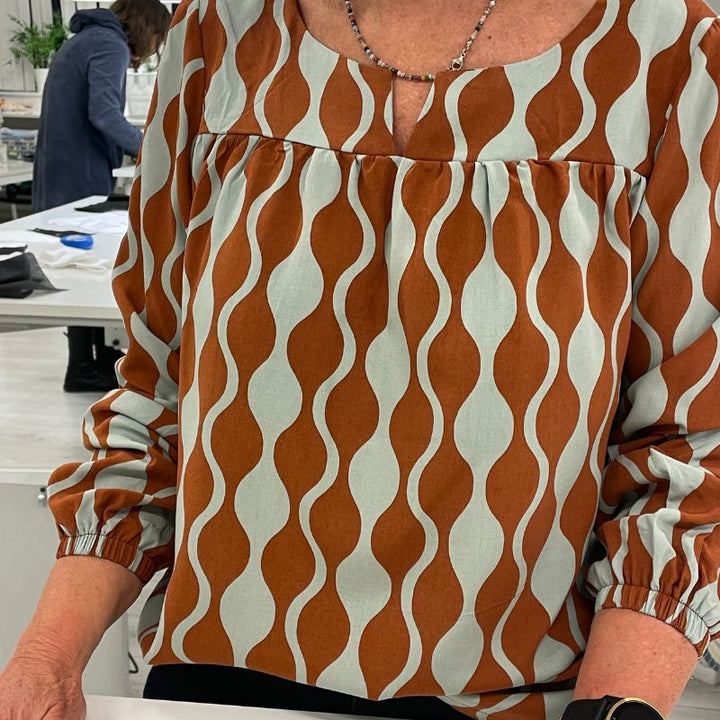 Fast ecovero (viscose) med snoninger, Okker/salvie
