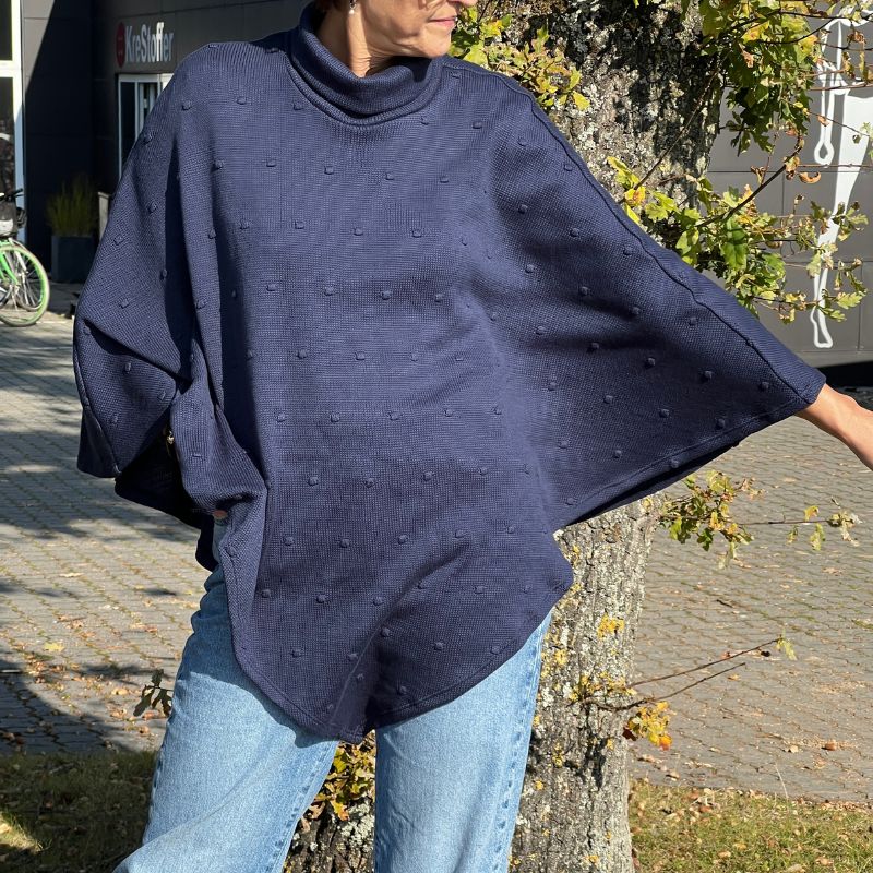 Strikstof med dutter i blå