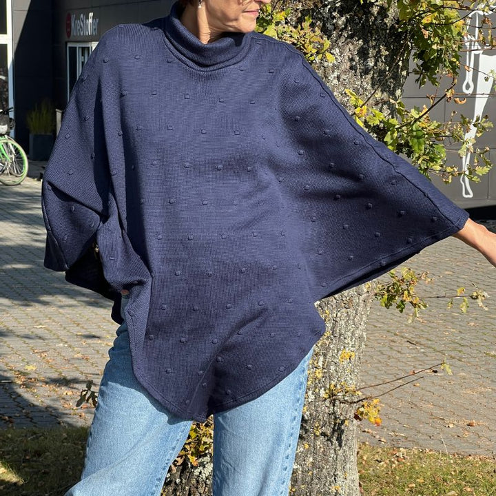 Strikstof med dutter i blå