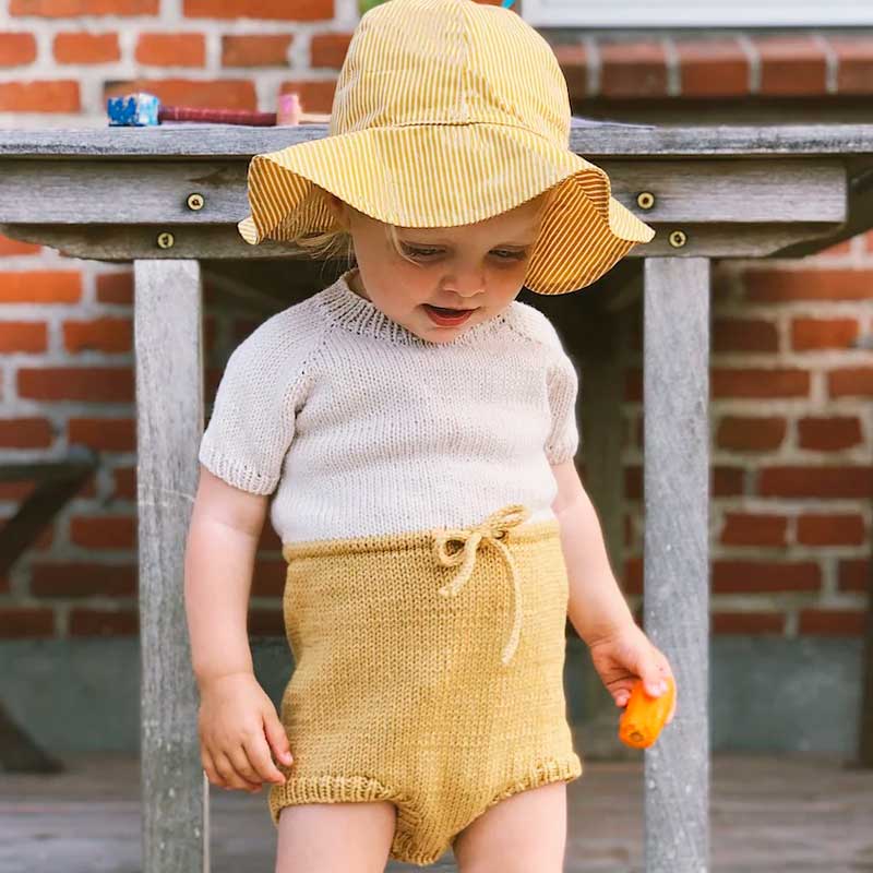 Maries Romper fra PetiteKnit (Opskrift i fysisk papirudgave)