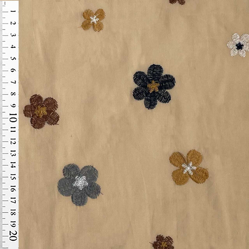 Fast bomuldsvoile med broderede blomster, sand