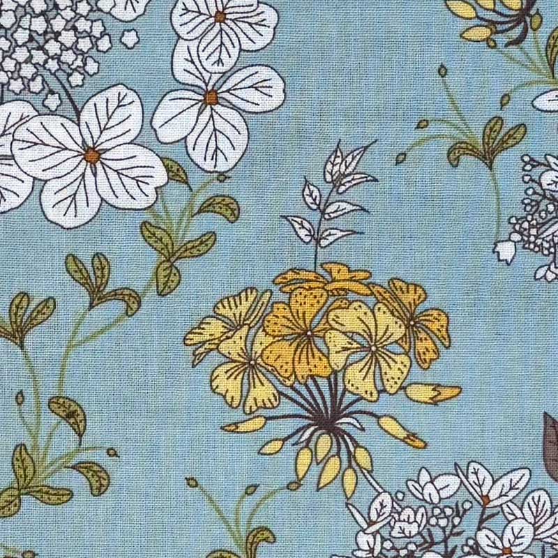 Fast bomuld med spredte blomster