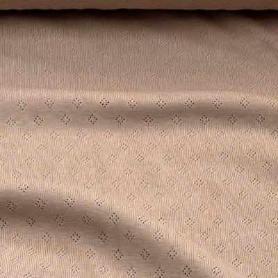 Bomuldsjersey med lille hulmønster i beige