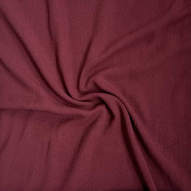 Ensfarvet fast viscose / hør i støvet bordeaux