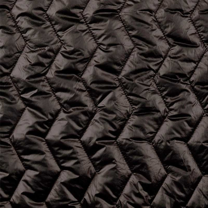 Quilt i zig-zag baner i sort