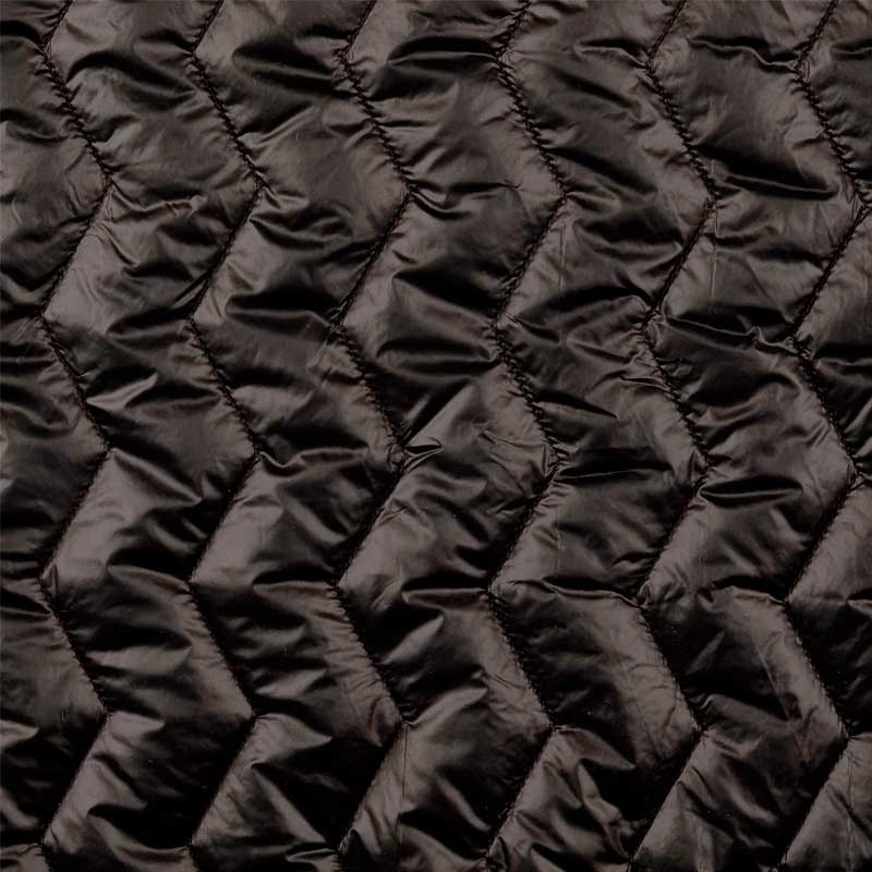 Quilt i zig-zag baner i sort