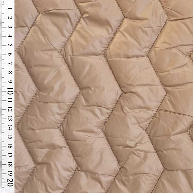 Quilt i zig-zag baner i beige