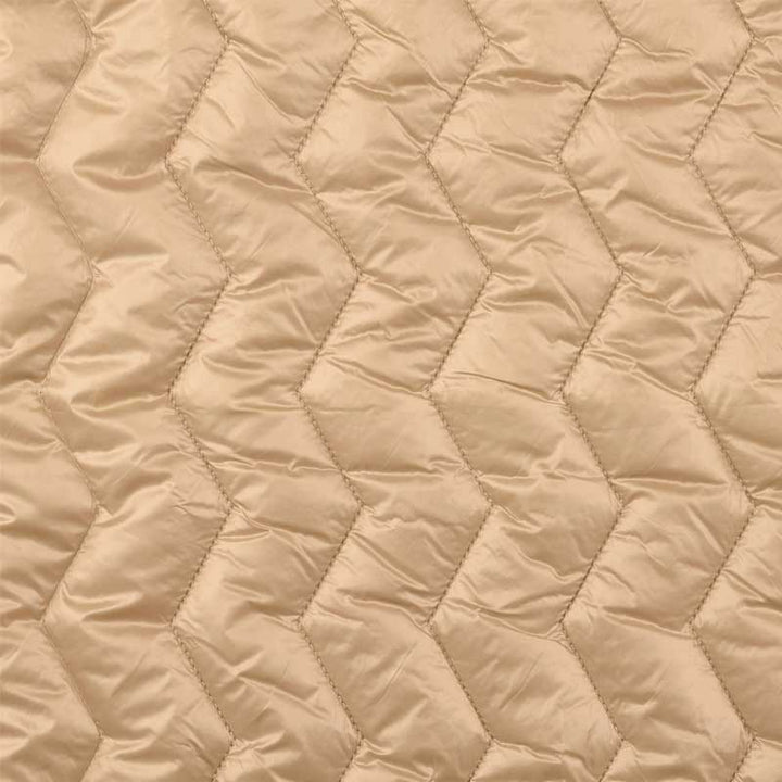 Quilt i zig-zag baner i beige