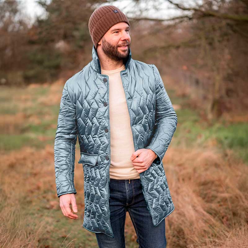 Quilt i zig-zag baner i lys petrol