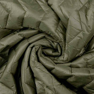 Quilt i zig-zag baner i olivengrøn