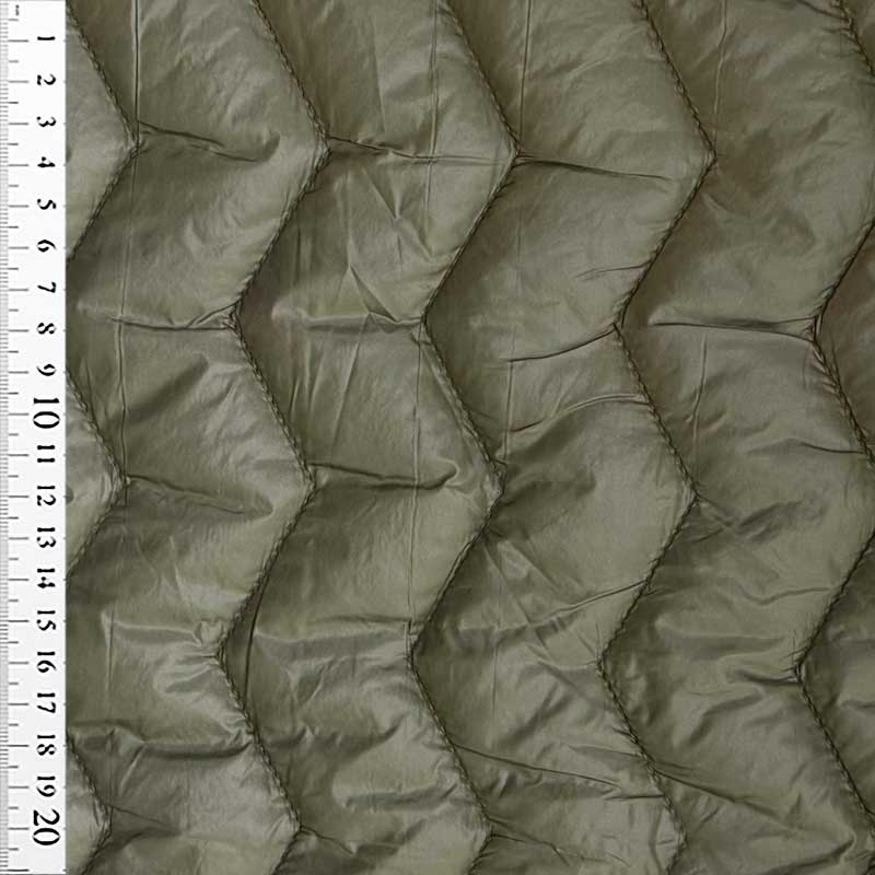 Quilt i zig-zag baner i olivengrøn