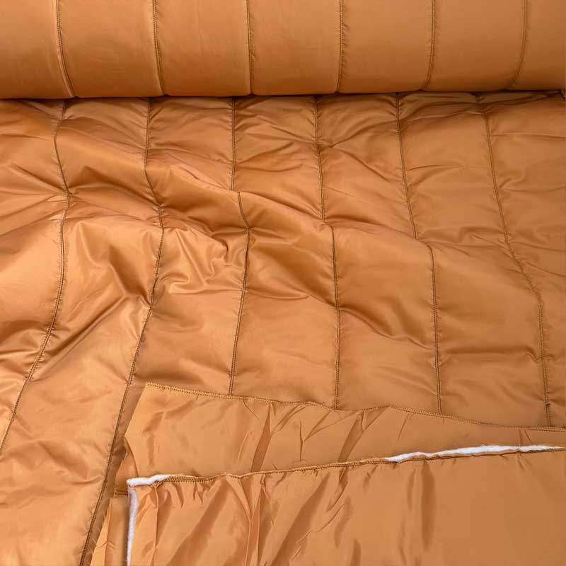 Quilt i baner i orange