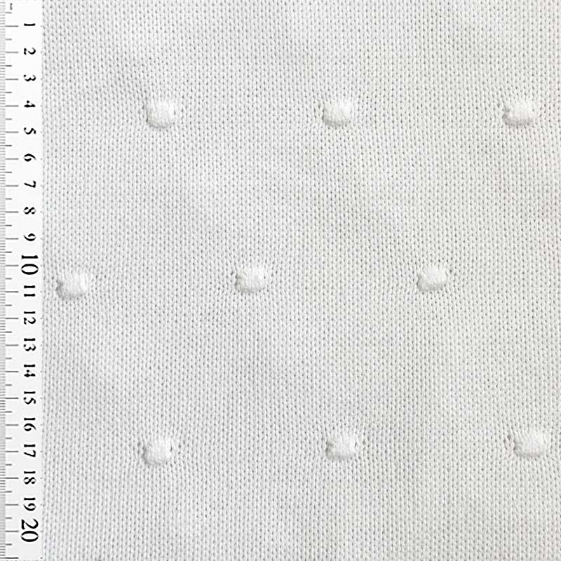 Strikstof med dutter i off-white