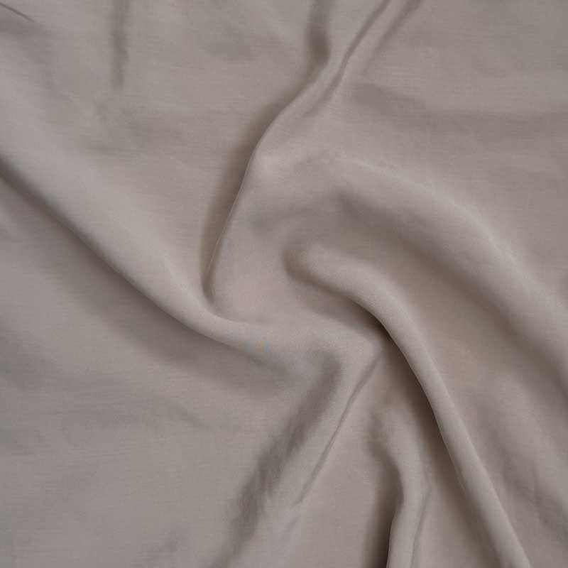 Ensfarvet poplin i beige