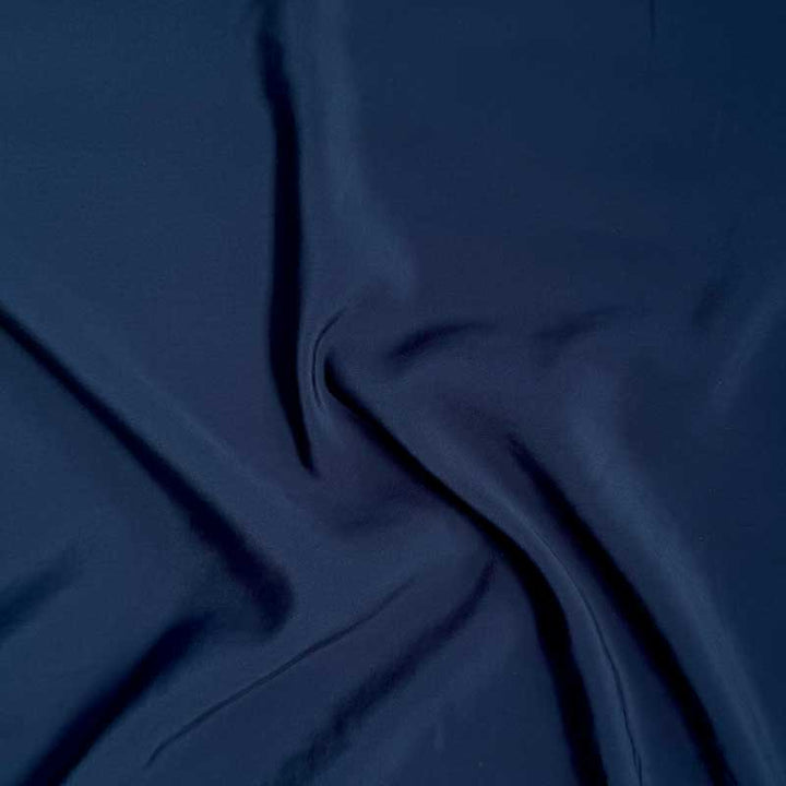 Ensfarvet poplin i marine