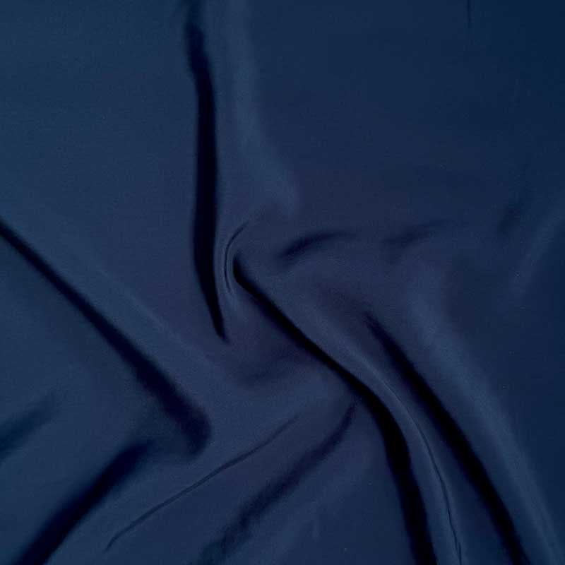 Ensfarvet poplin i marine