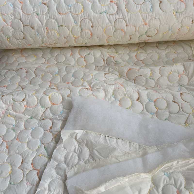 Quilt med farvede blomster - KreStoffer