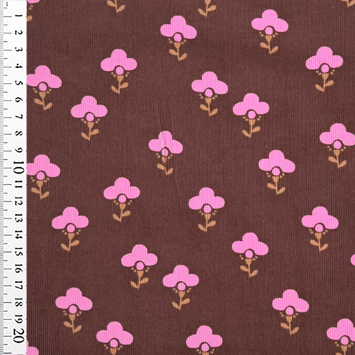 Babyfløjl med grafisk blomsterlogo i brun