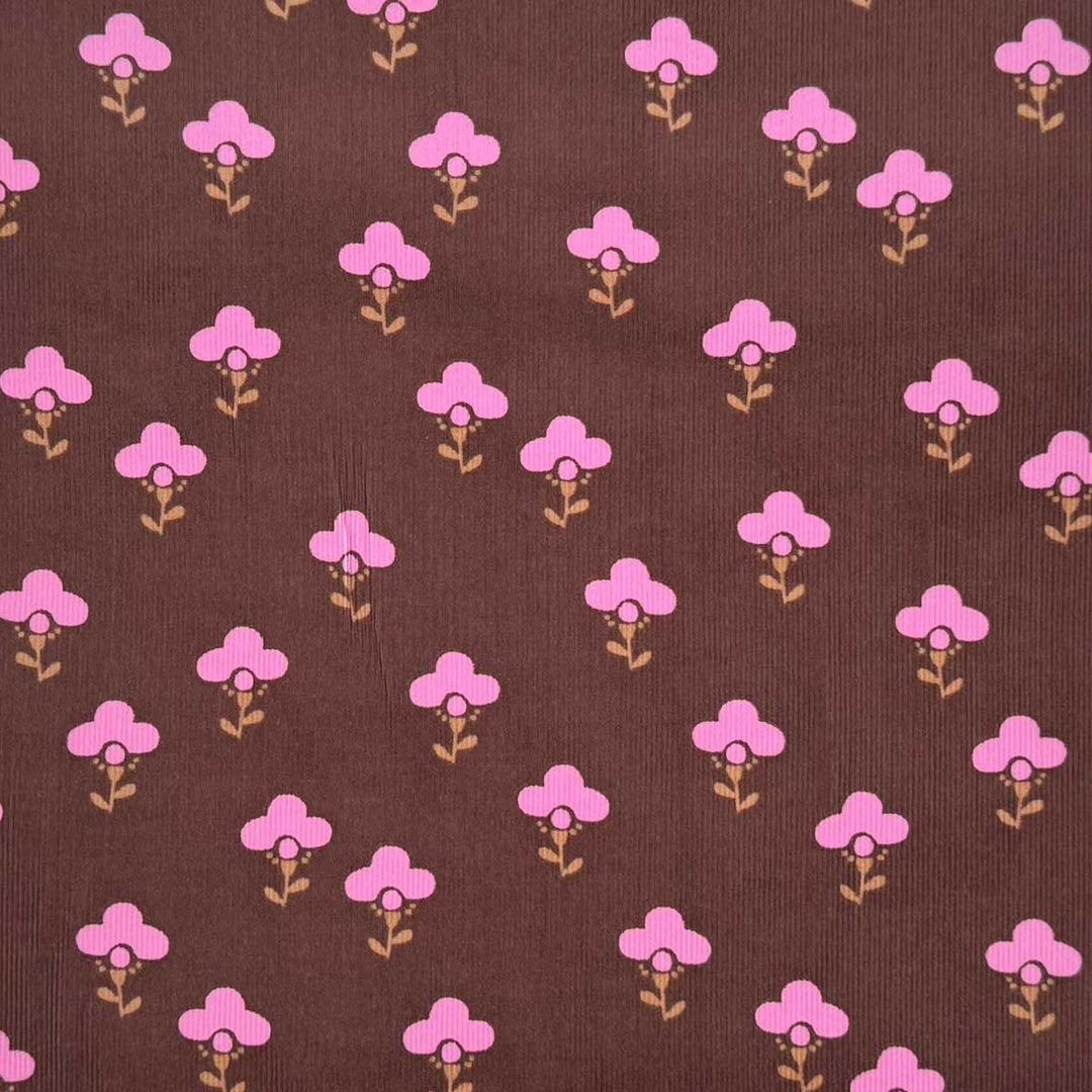 Babyfløjl med grafisk blomsterlogo i brun