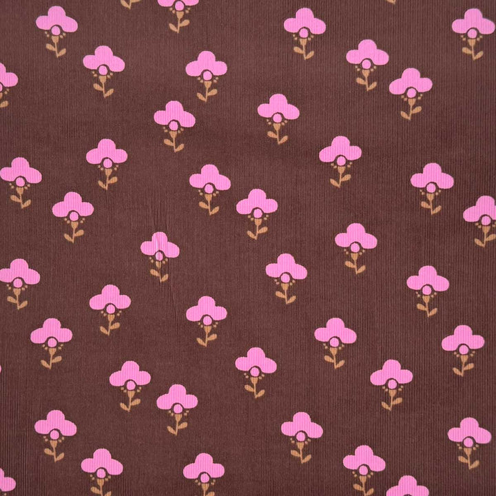 Babyfløjl med grafisk blomsterlogo i brun