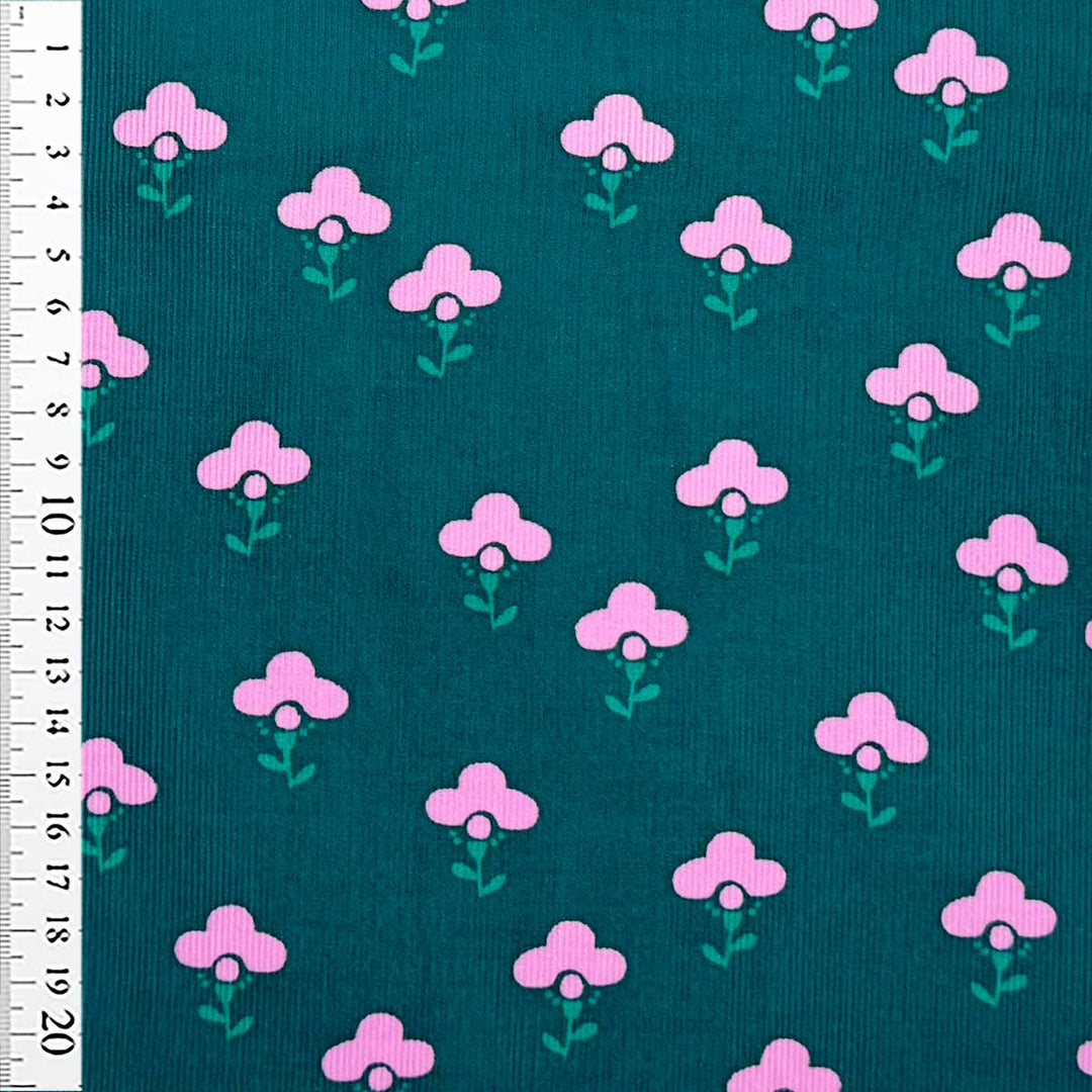 Babyfløjl med grafisk blomsterlogo i flaskegrøn