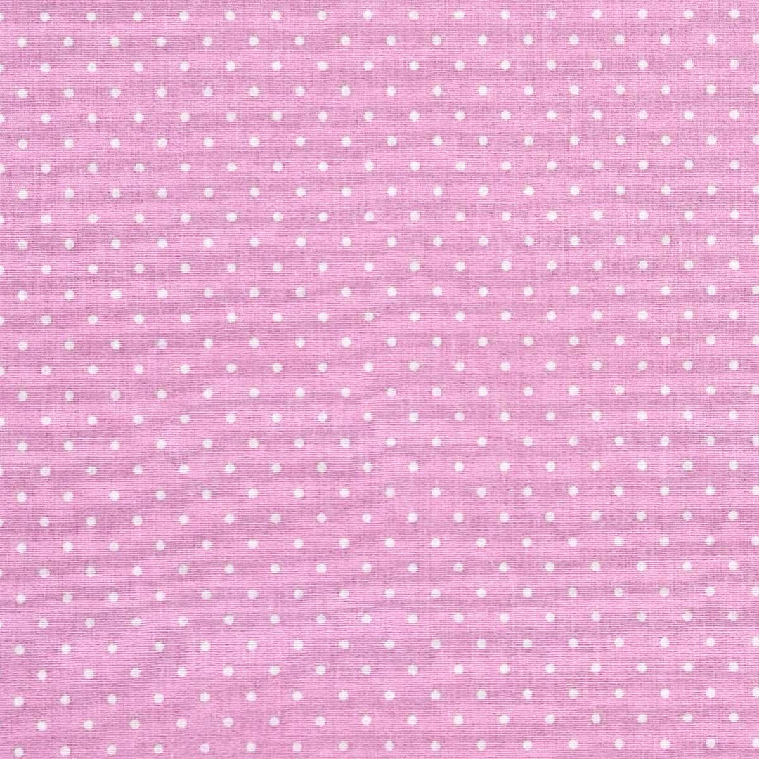 Fast bomuld med hvide prikker i pink