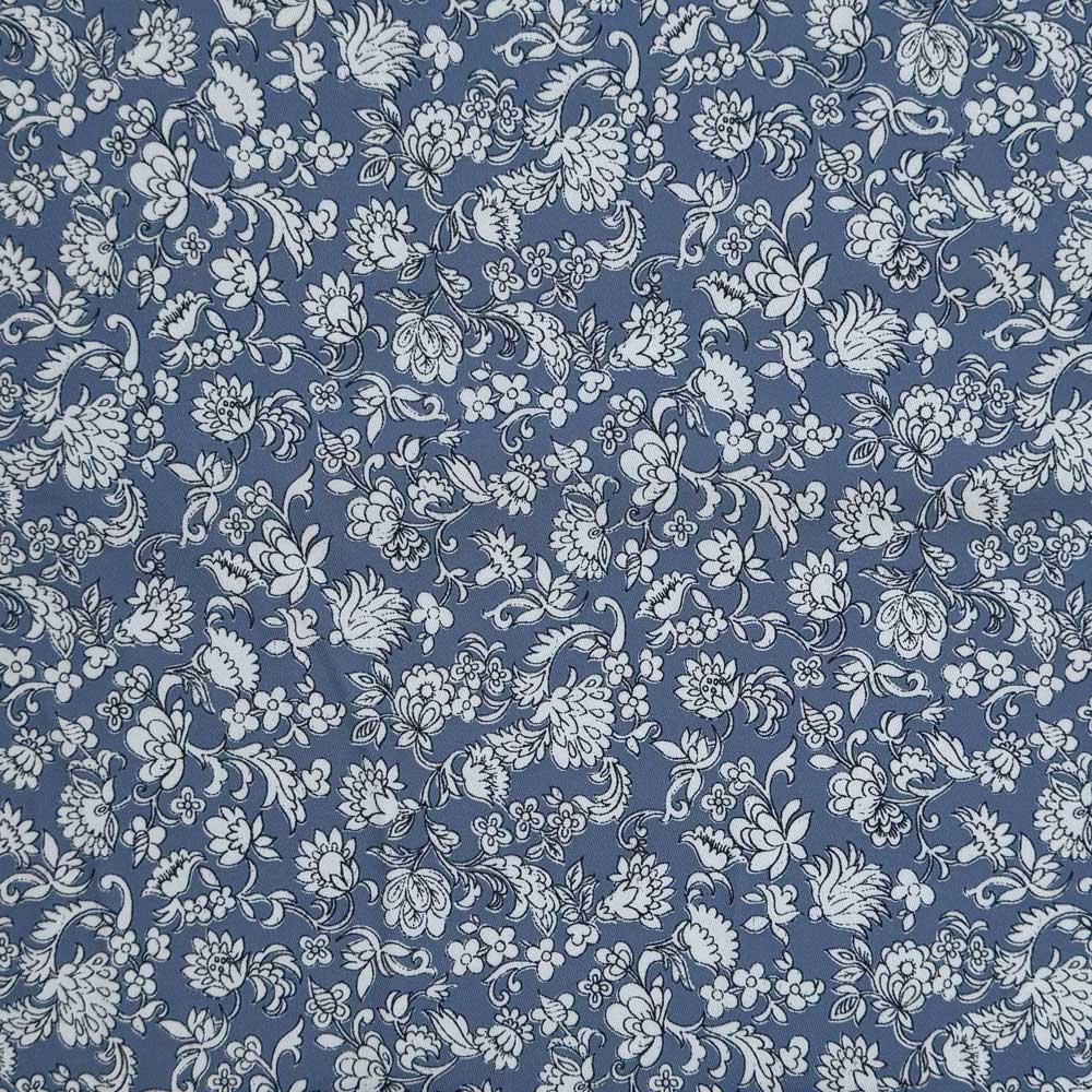 Twill med blomster på blå bund