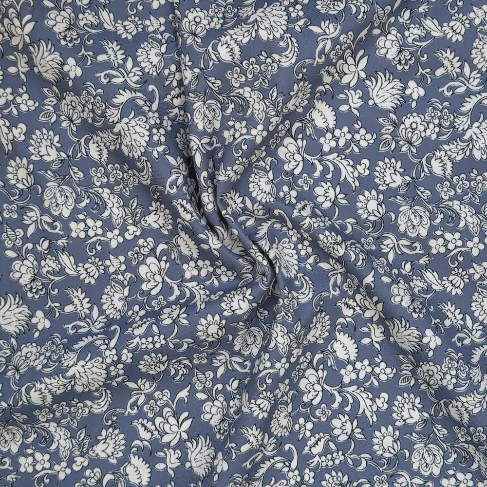 Twill med blomster på blå bund