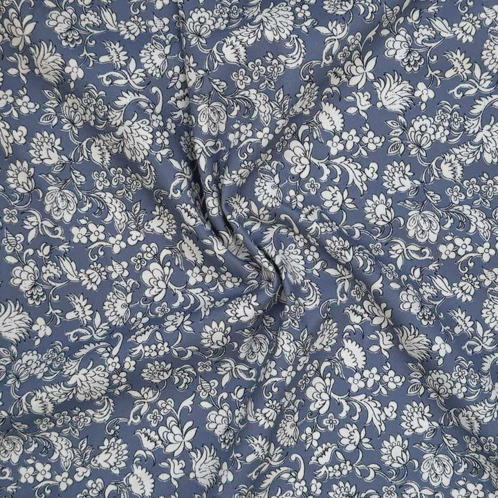 Twill med blomster på blå bund