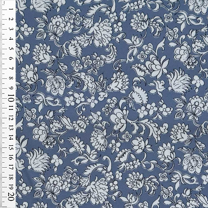 Twill med blomster på blå bund