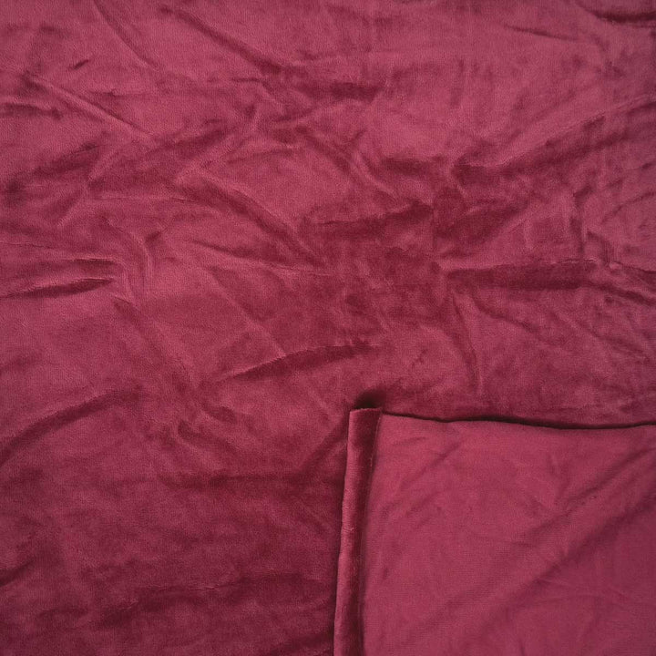 Velour med stræk i lys vinrød