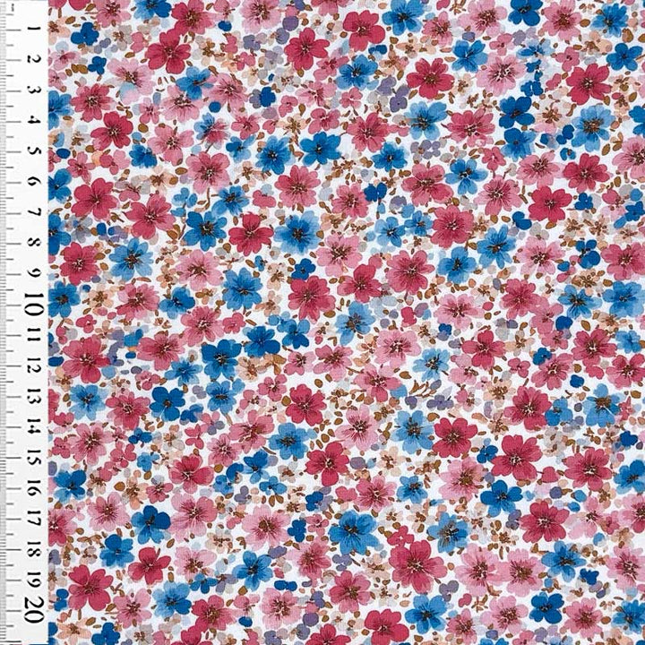 Bomuldsjersey med blå og rødlige blomster