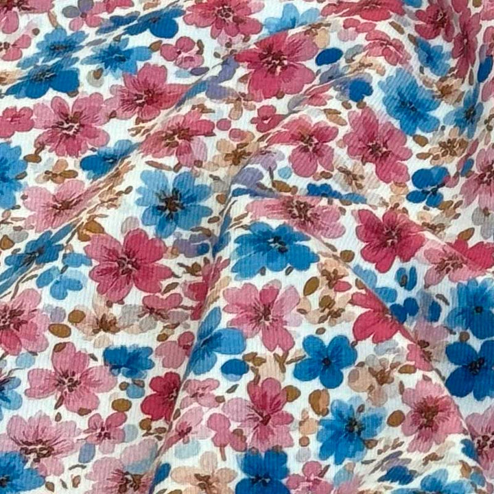Bomuldsjersey med blå og rødlige blomster