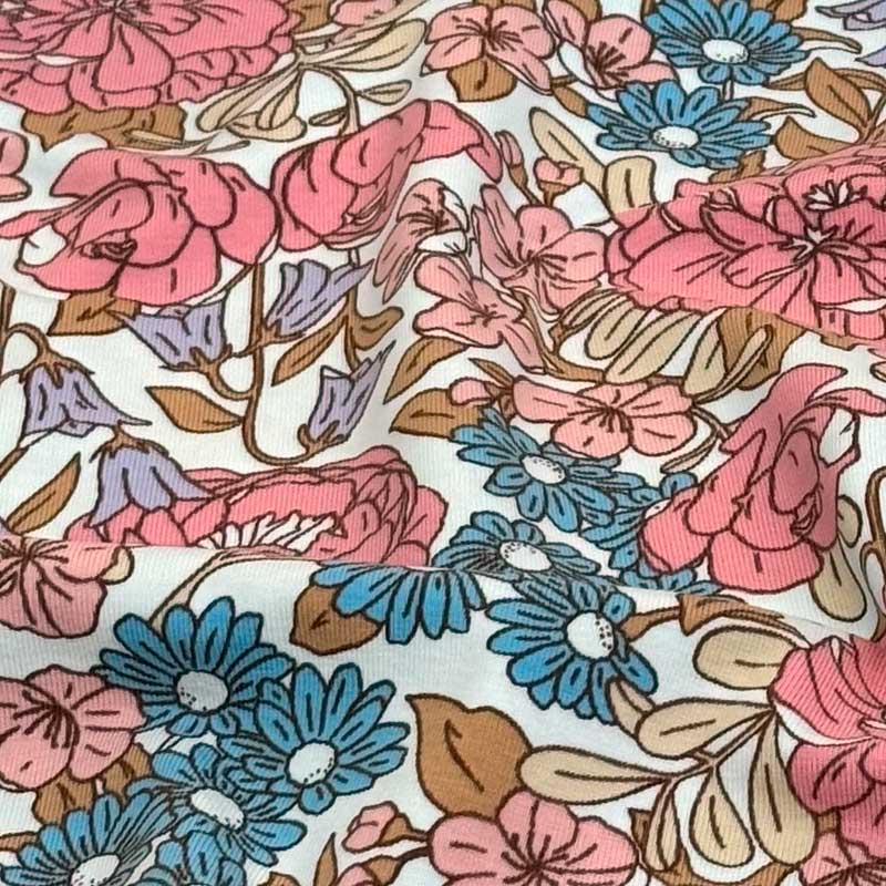Bomuldsjersey med rosa og petrol blomster