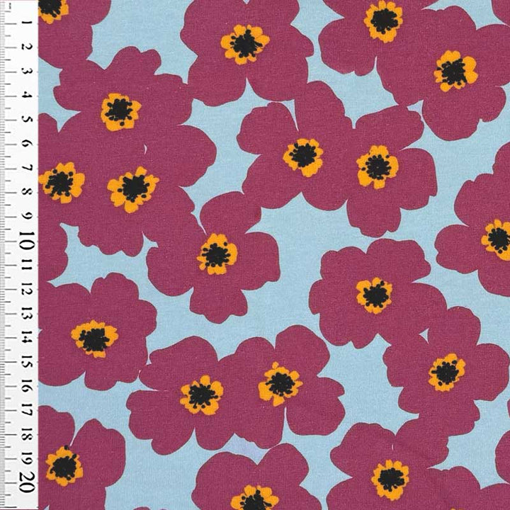 Bomuldsjersey med hindbær rød smørblomster
