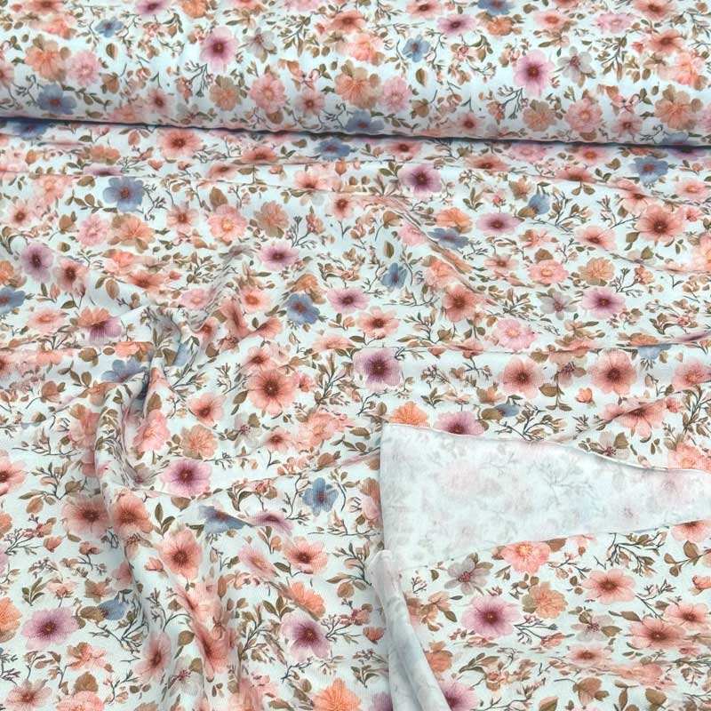 Bomuldsjersey med lyse romantiske blomster
