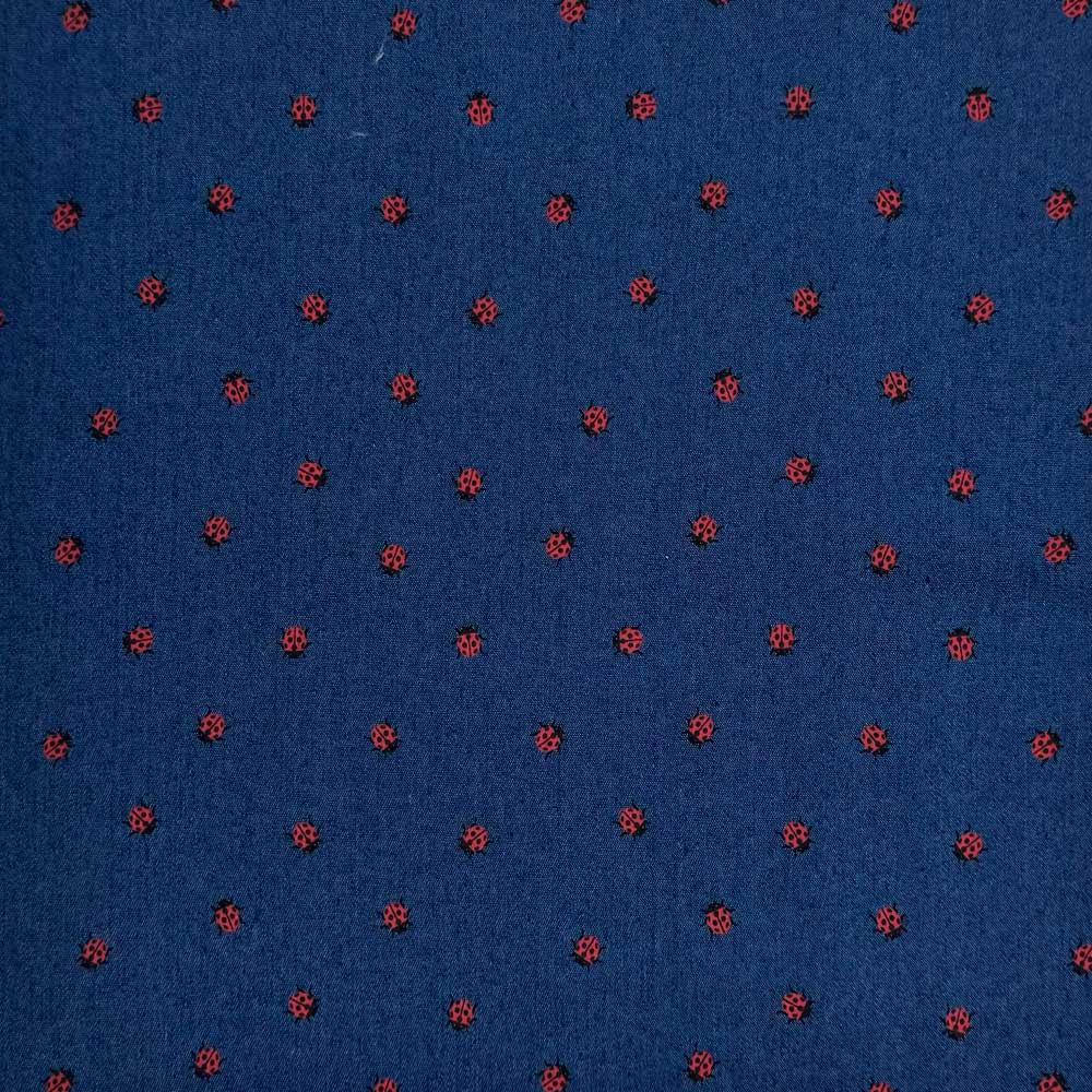 Denim med små printet mariehøns