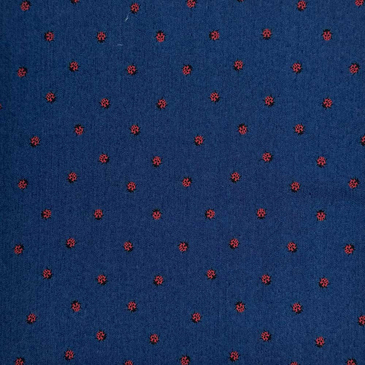 Denim med små printet mariehøns