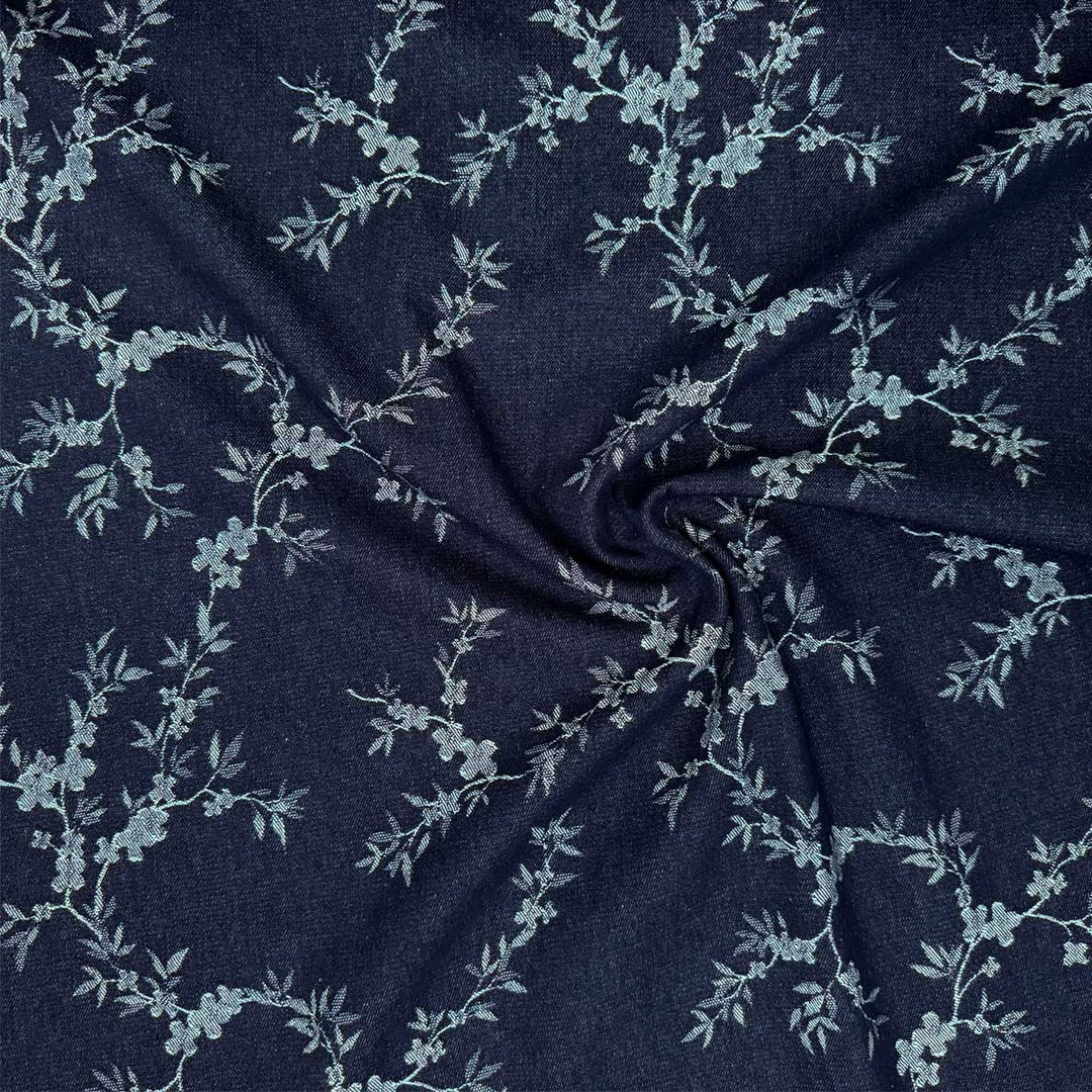 Denim med vævede blomsterranker i marineblå