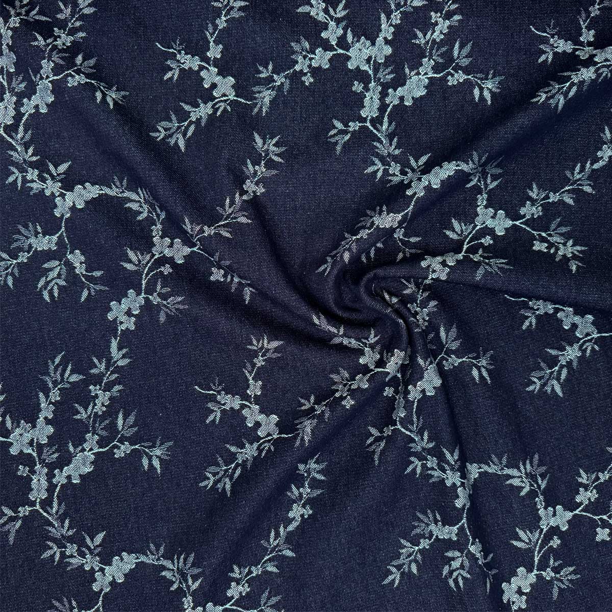 Denim med vævede blomsterranker i marineblå